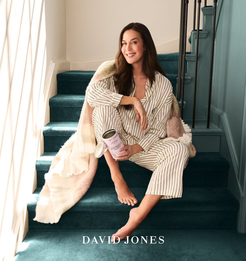 Megan Gale wearing a striped Gingerlilly pyjama set for the David Jones Mother's Day campaign
