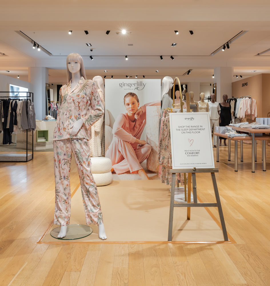 Gingerlilly pyjama display at the David Jones Mother's Day pop-up, featuring a floral pyjama set on a mannequin beside branded signage