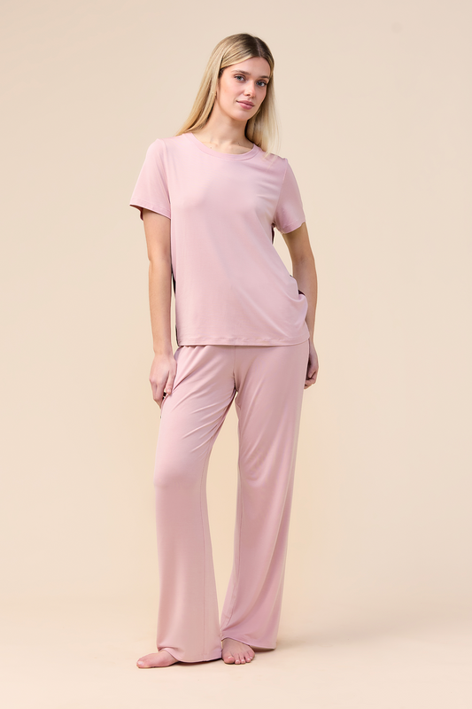 Woman wearing the Inez Bamboo Pant with Stripe in Pink, front view