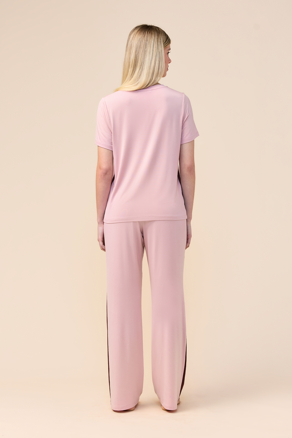 Woman wearing the Inez Bamboo Pant with Stripe in Pink, back view