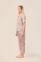 Woman wearing the Millie Bambi Print Long PJ Set in Brown, side view