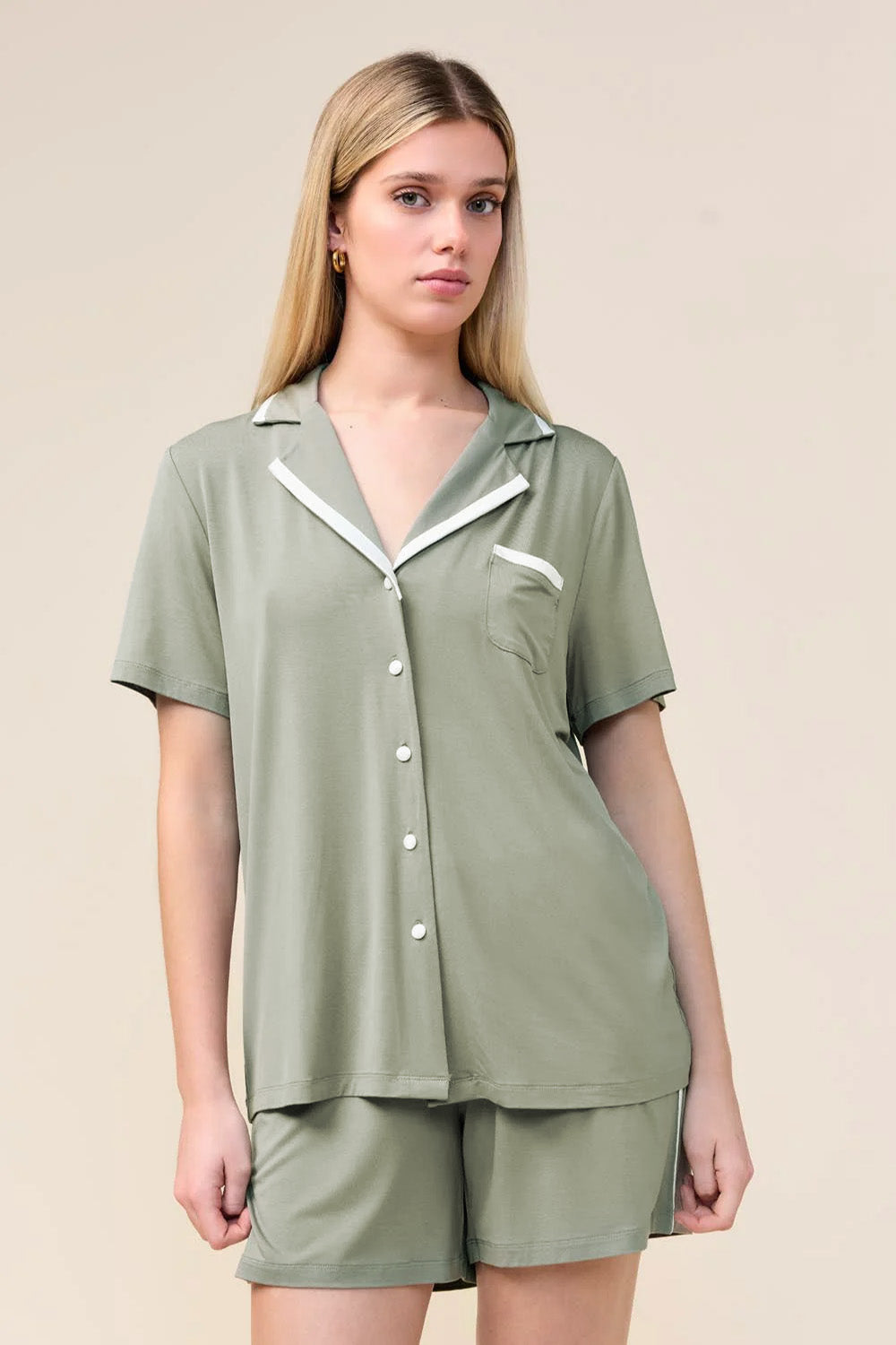 Woman wearing the Allegra Short Bamboo PJ Set in Olive, close front view of camp collar and pocket