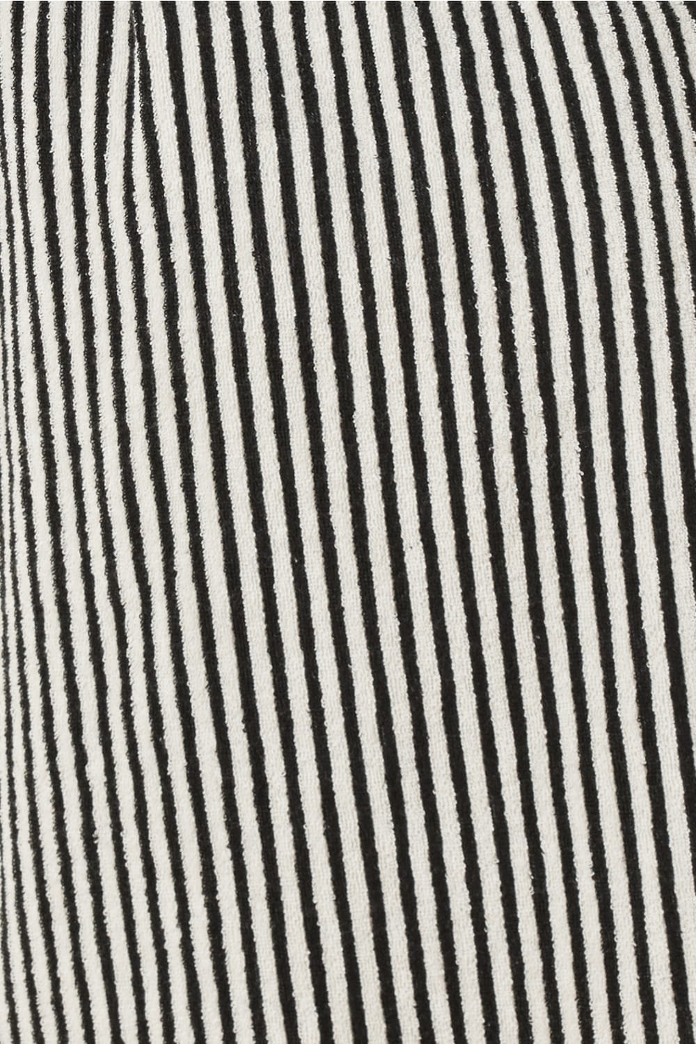 Close-up of black and white striped fabric texture striped adriana terry towel robe