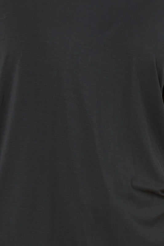 Close up of Anya Bamboo Sporty PJ Set Black fabric showing the smooth bamboo texture and soft black material.