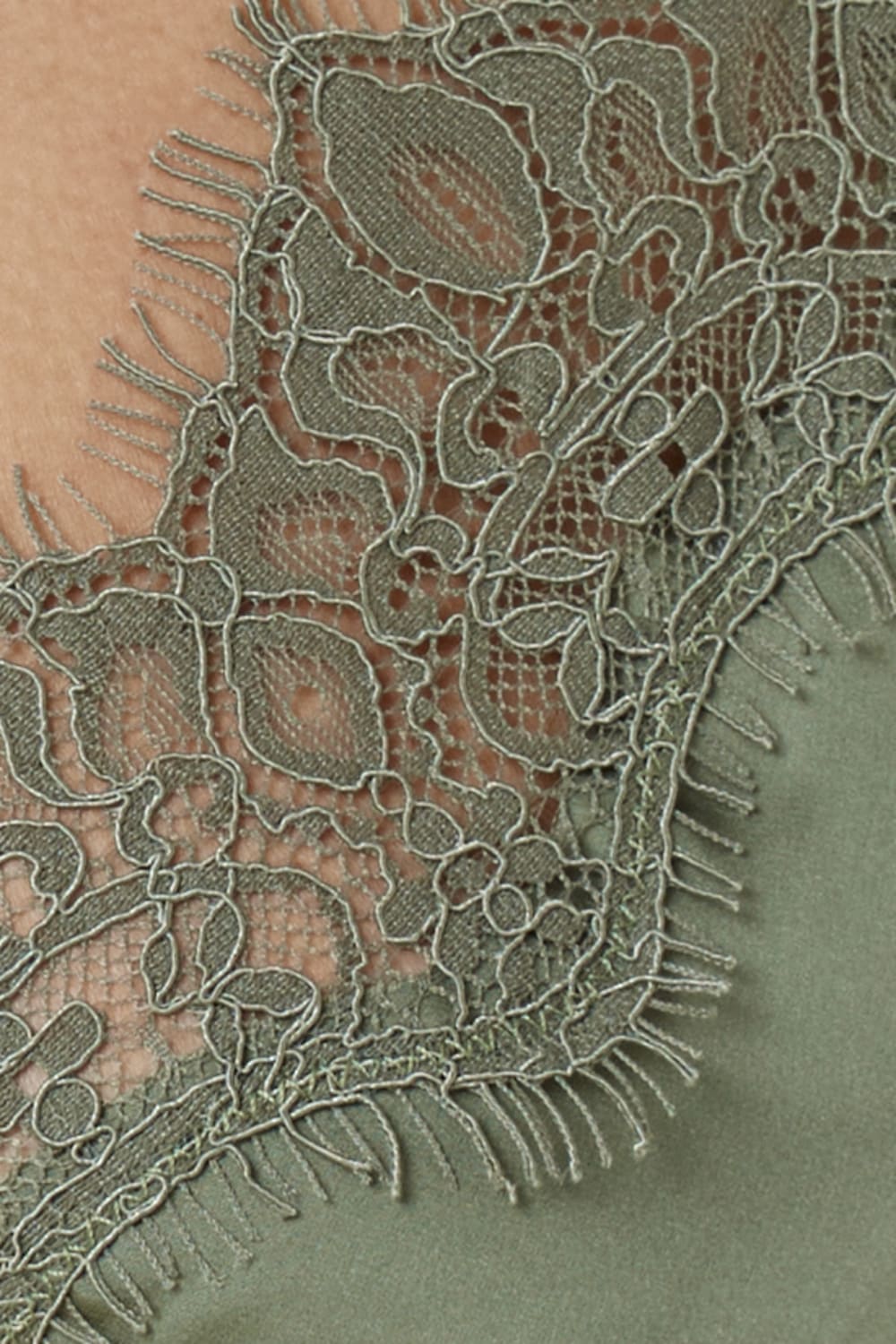 Close up of Azalia Silky Satin Short Chemise Olive lace hem detail showing delicate lace trim layered over the smooth olive satin fabric.
