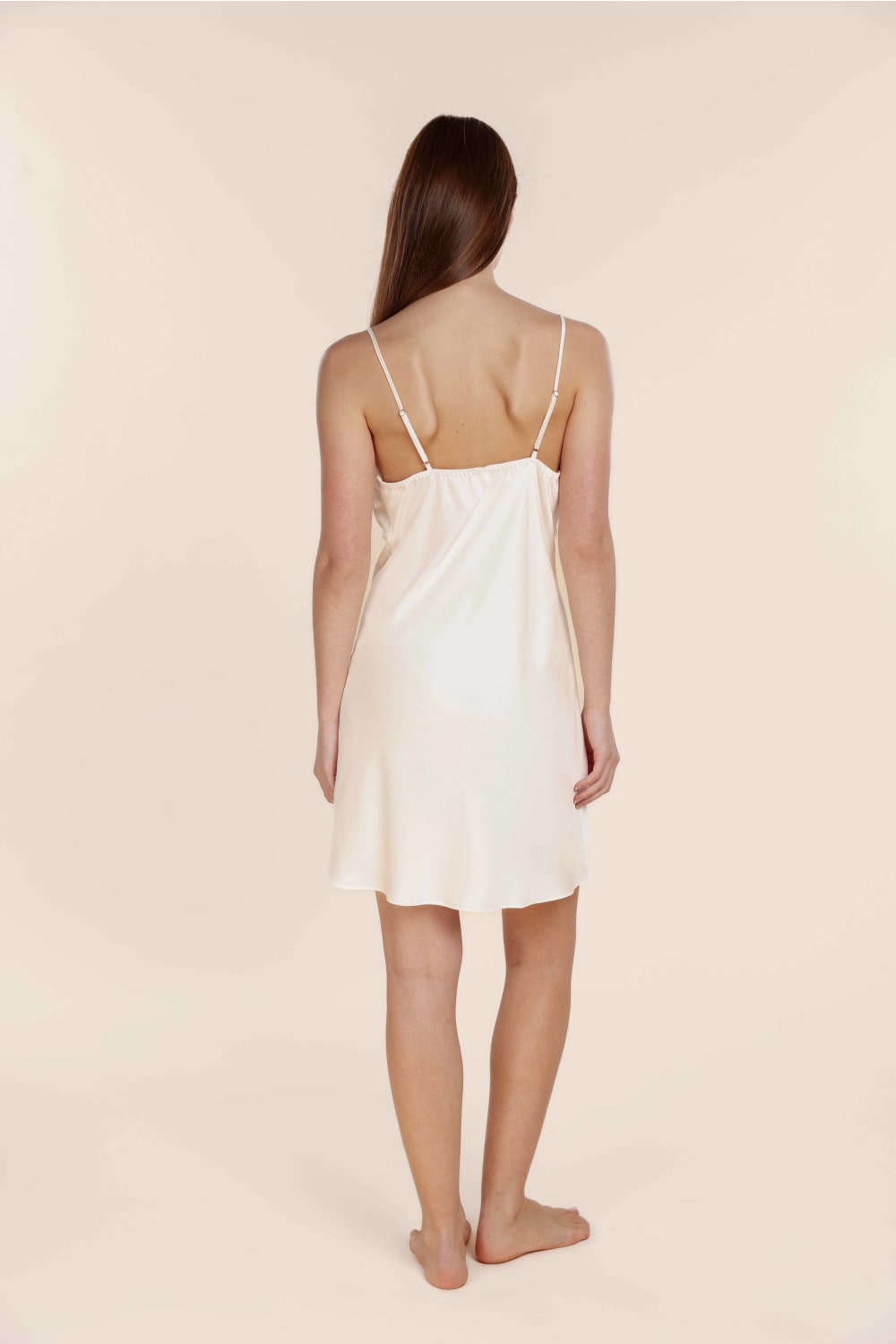 Woman wearing a white ivory Azalia Silky Satin Short Chemise back view