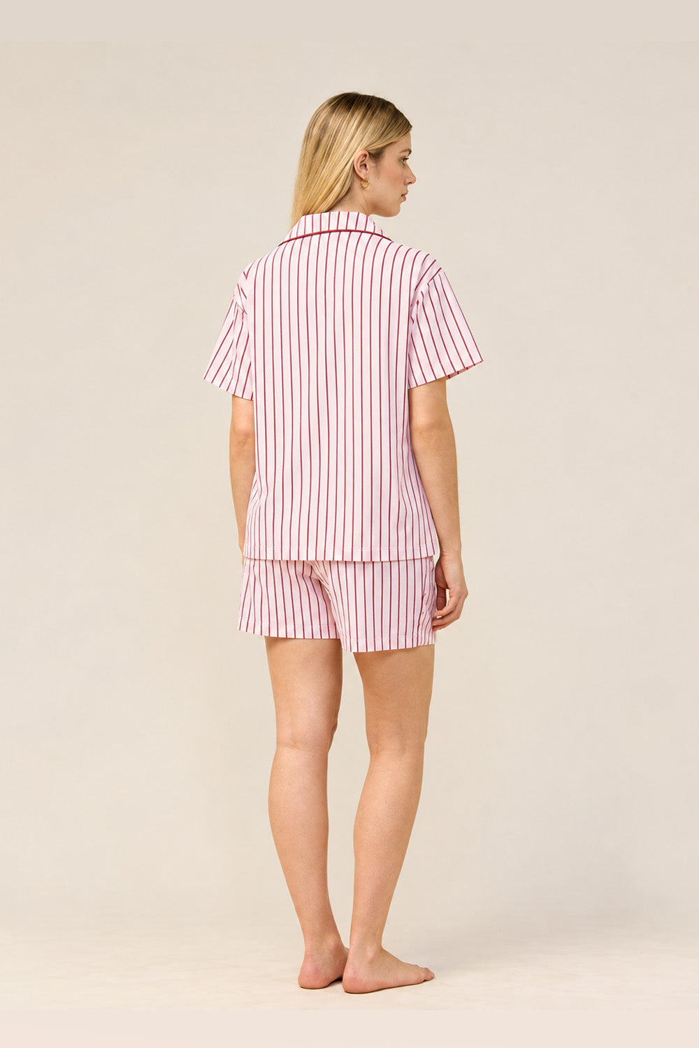 Woman wearing the Poppy Stripe Short PJ Set in Pink, back view