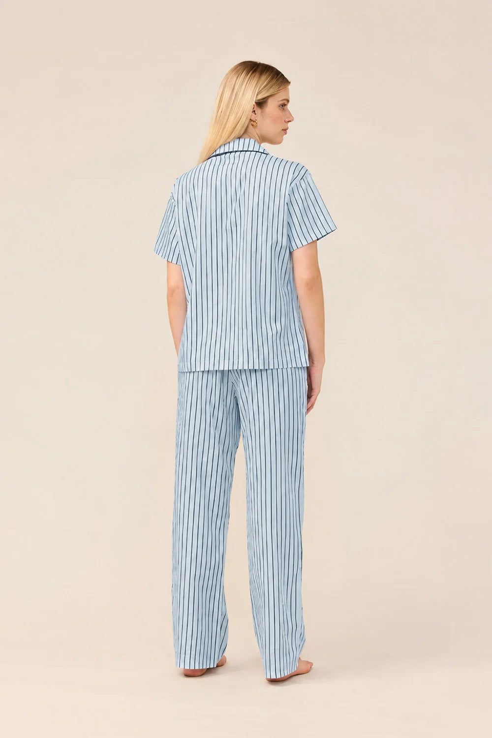 Woman wearing the Lisa Stripe Long Pant PJ Set in Blue, back view
