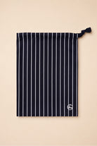 Willow Cotton Stripe PJ Set in Black shown with its matching black striped drawstring bag