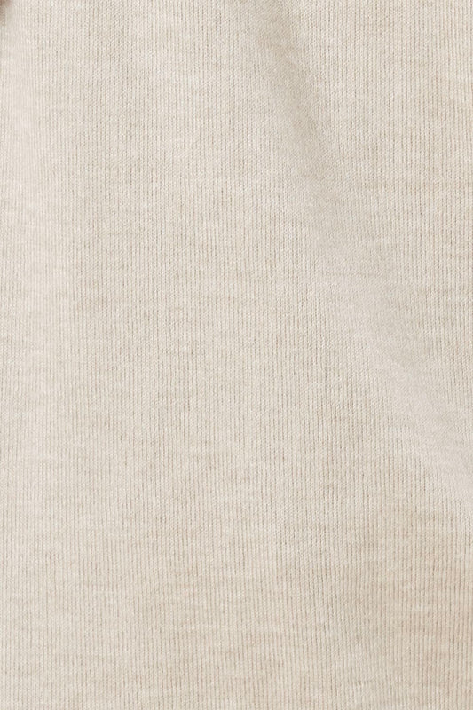 Close-up of beige fabric texture
