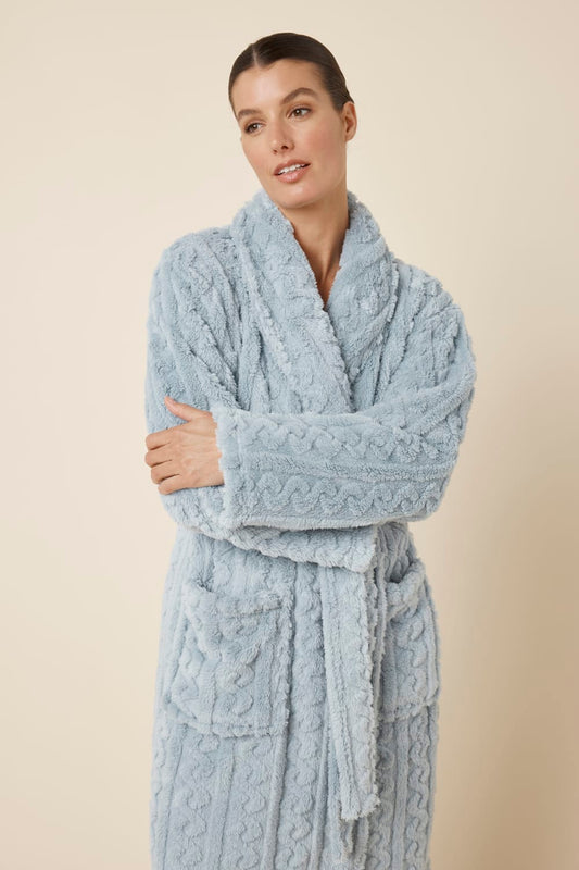 Woman wearing a light blue cable knit Gabriella Plush Long Robe with arms crossed looking comfortable