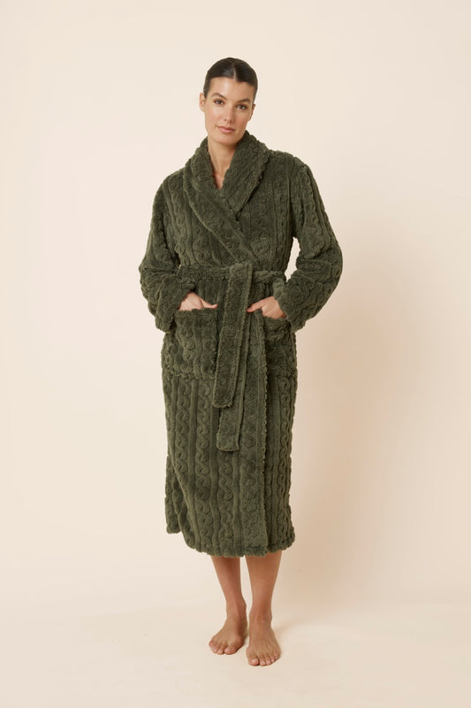Woman wearing a olive green Gabriella Plush Long Robe with hands in both front pockets and waist tie done up