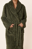 Woman wearing a green olive cable-knit Gabriella Plush Long Robe