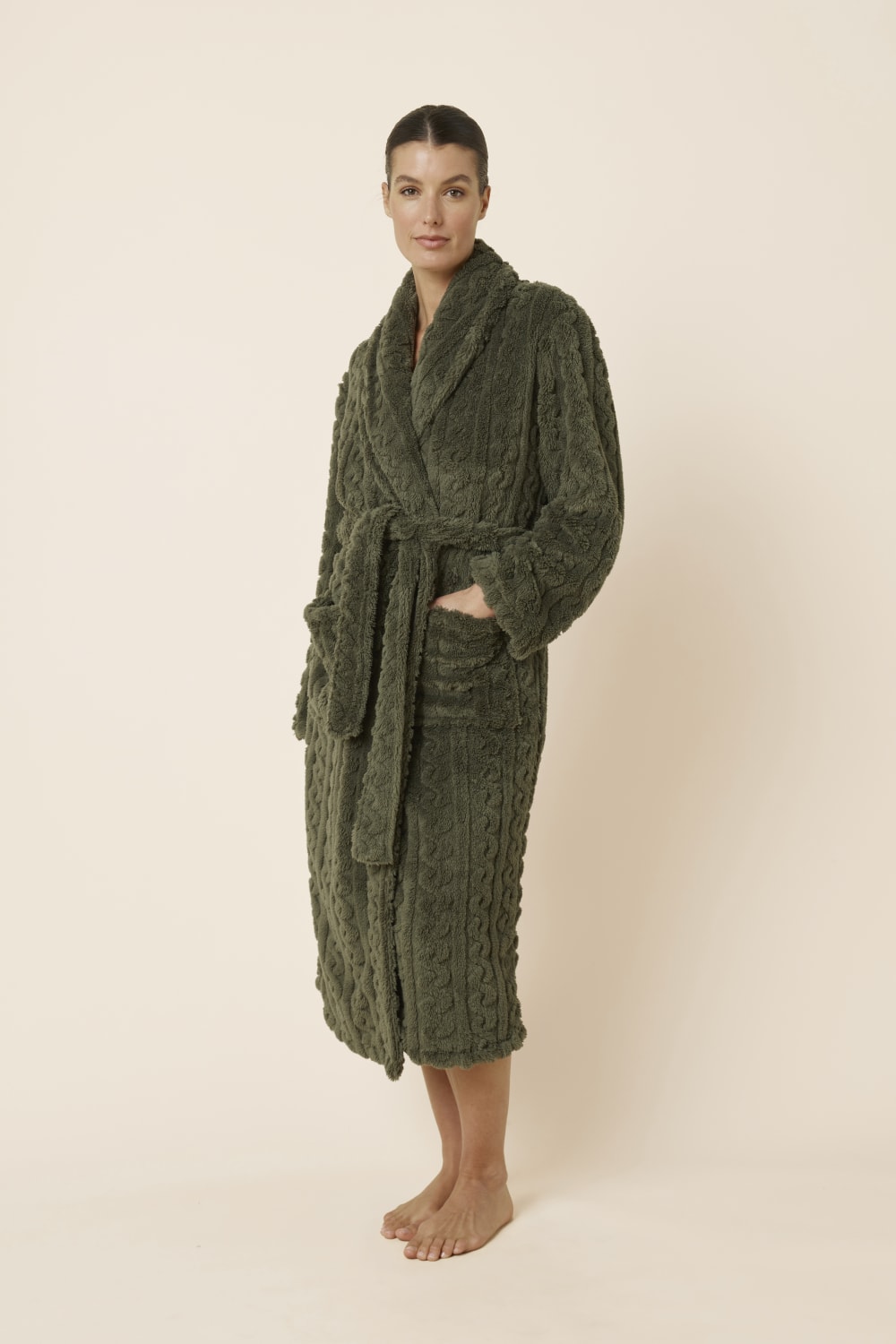 Woman wearing a olive green Gabriella Plush Long Robe with a side on view and hand in pocket