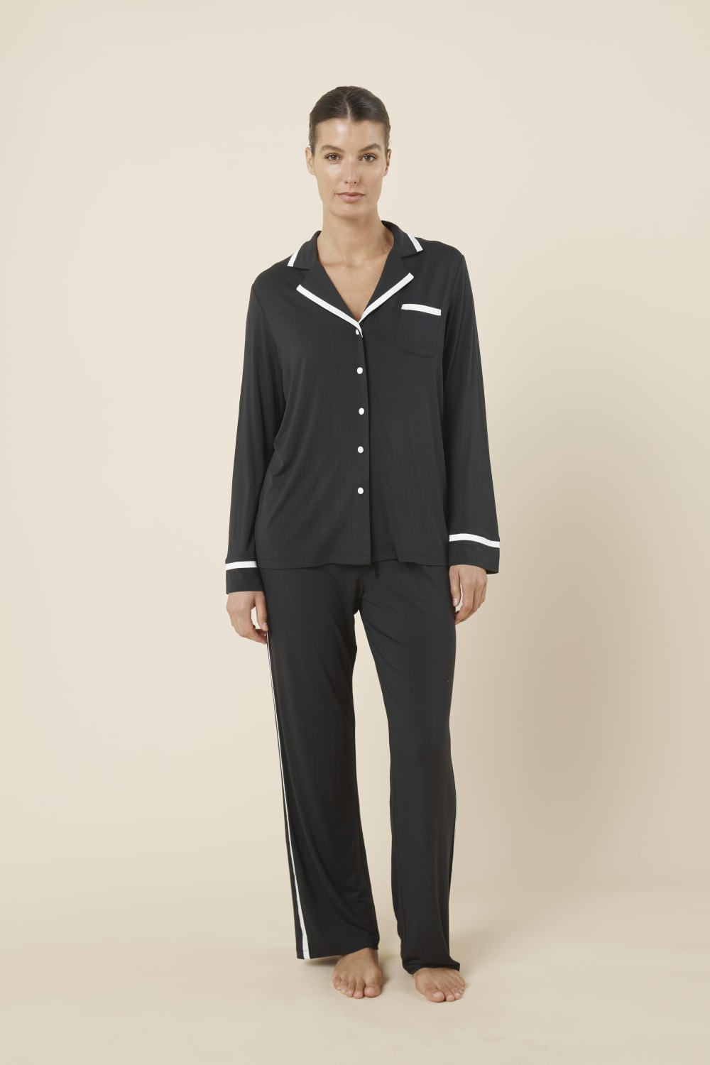 Woman wearing Grace Bamboo pyjama PJ Set Black from front full body view