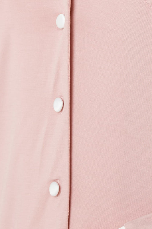 Close up of Grace Bamboo PJ Set Pink bamboo fabric with contrast buttons and piping detail