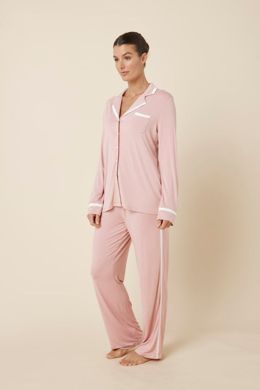 Woman wearing Grace Bamboo PJ Set Pink side view showing soft bamboo fabric and relaxed silhouette