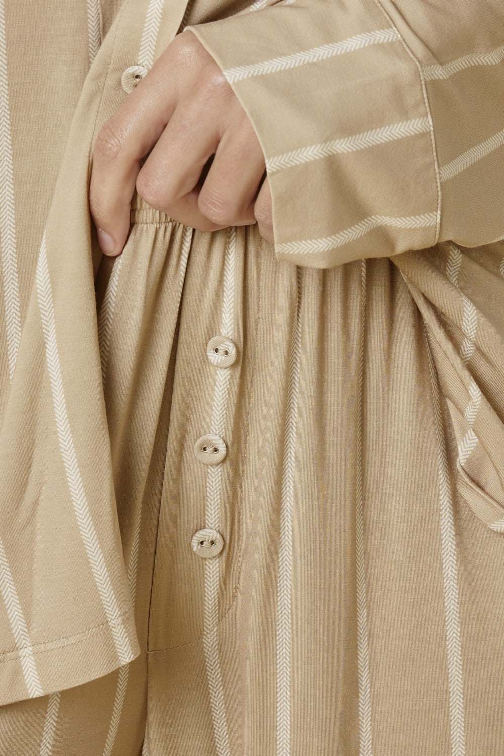 Close up of the Harlow Bamboo Striped PJ Set Biscuit Buttons Pants showing the buttons and V detail on the white stripes