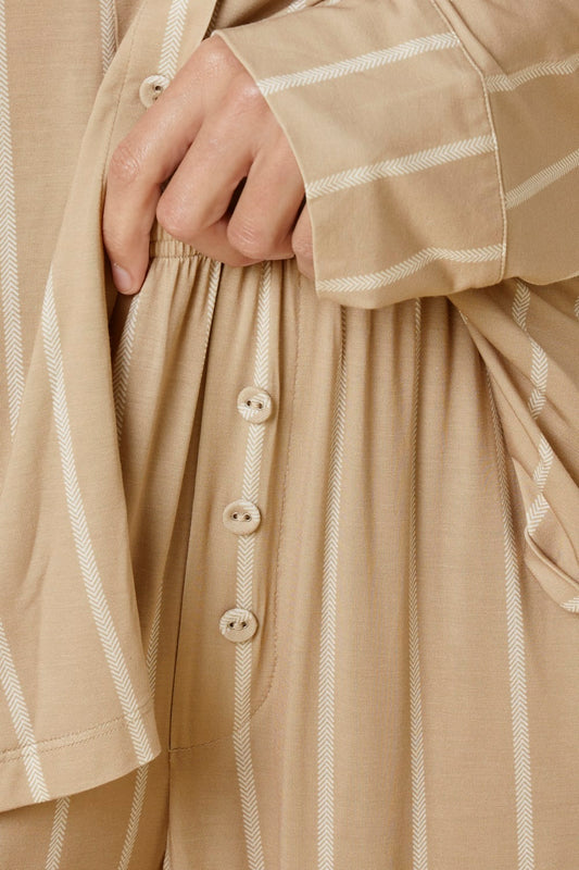 Close up of the Harlow Bamboo Striped PJ Set Biscuit Buttons Pants showing the buttons and V detail on the white stripes