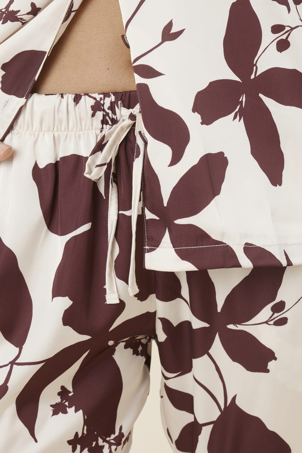 Ivy Silky Satin pyjama PJ set burgundy pants with flowers detail close up view