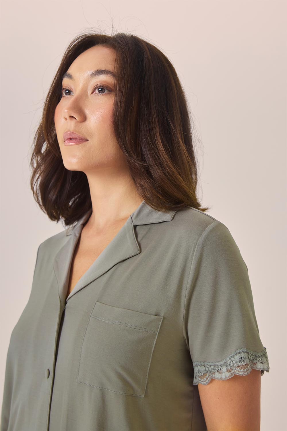 Close-up of the Joni Bamboo Short Set with Lace in Olive, showing the camp collar