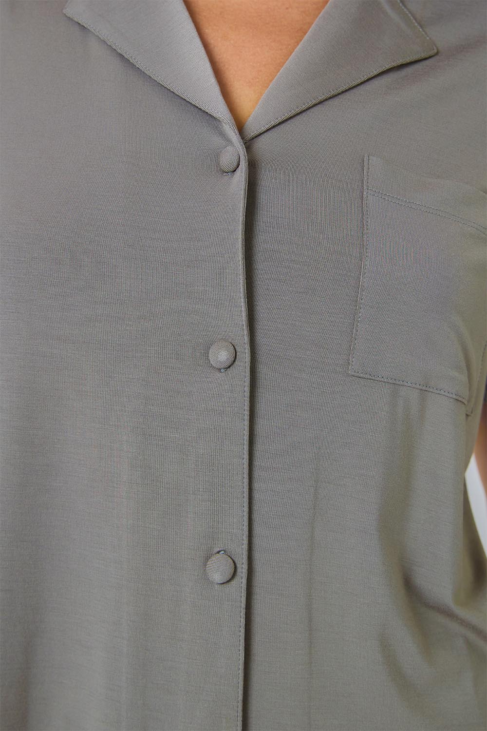 Close-up of the Joni Bamboo Short Set with Lace in Olive, showing the button-through front