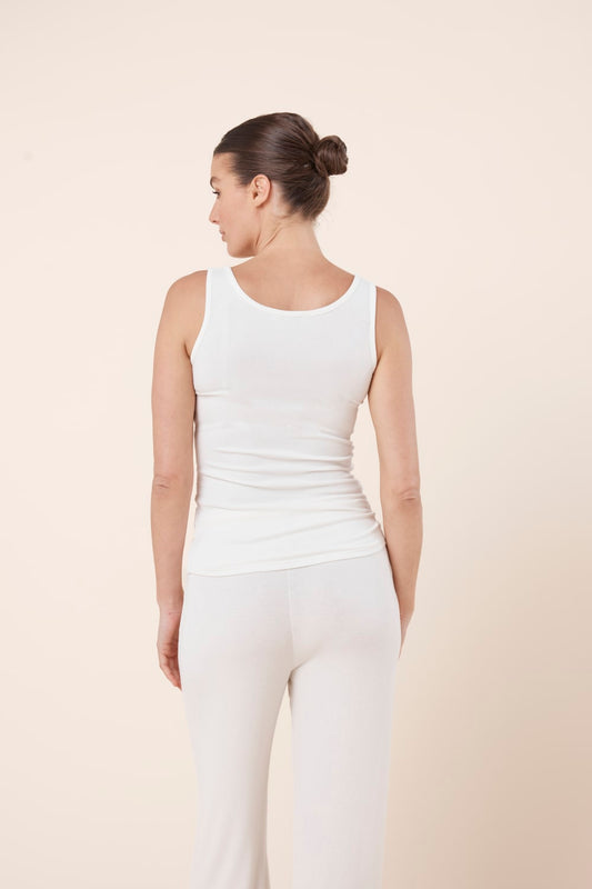 Woman wearing Liberty Ribbed Singlet Henley Top Ivory back view showing fitted ribbed silhouette