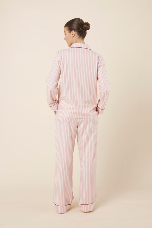 Woman wearing Octavia Cotton Stripe PJ Set Pink, back view of breathable cotton pyjama set with piped cuffs