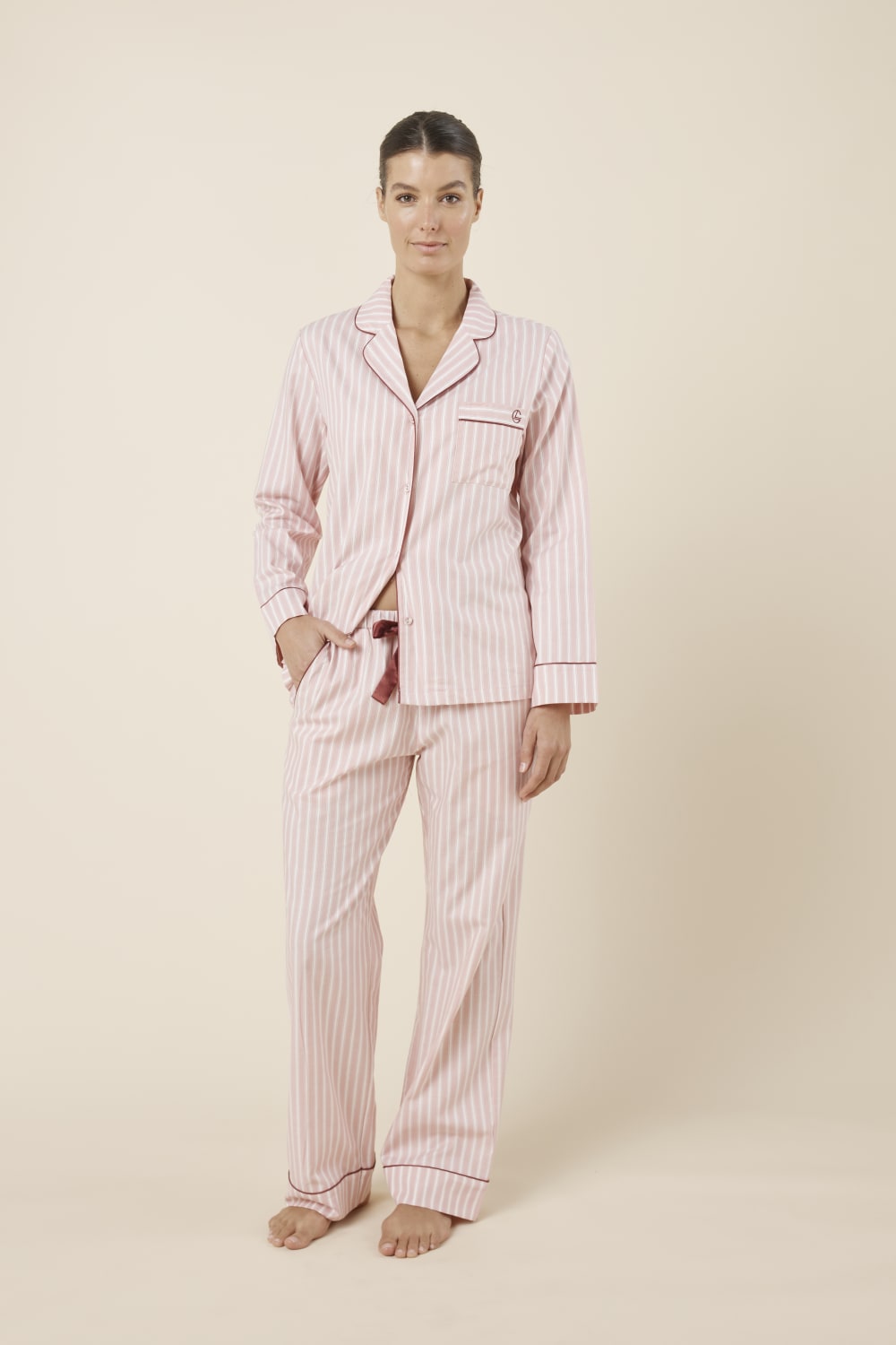 Woman wearing Octavia Cotton Stripe PJ Set Pink, front view of soft pink striped cotton pyjamas with contrast piping