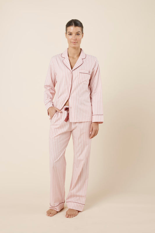 Woman wearing Octavia Cotton Stripe PJ Set Pink, front view of soft pink striped cotton pyjamas with contrast piping