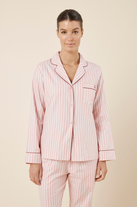 Woman wearing Octavia Cotton Stripe PJ Set Pink, relaxed fit button through cotton shirt with chest pocket