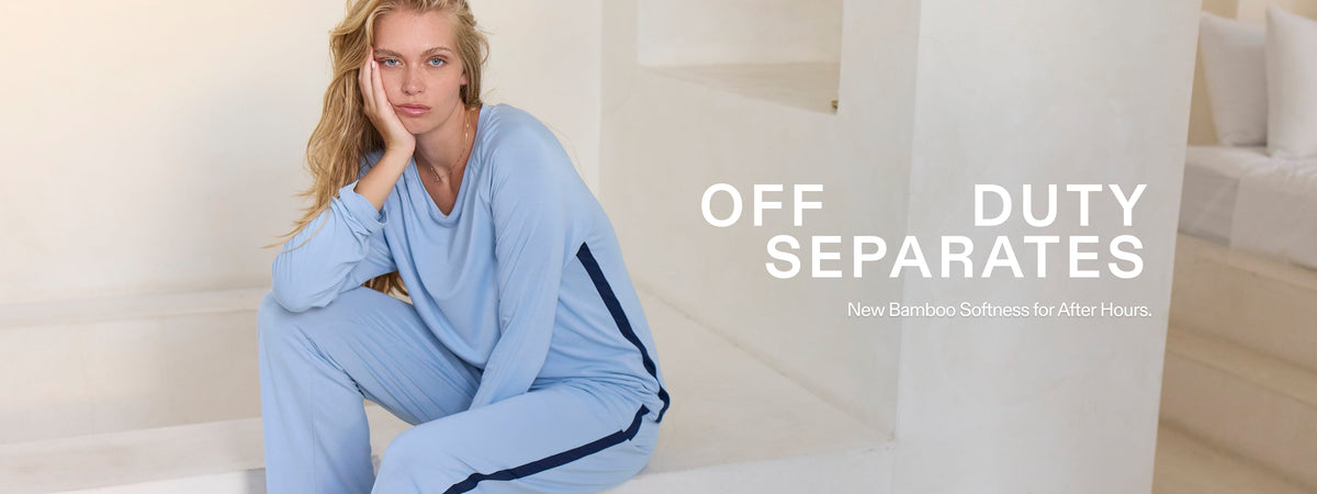 Women wearing blue bamboo separates  while sitting.