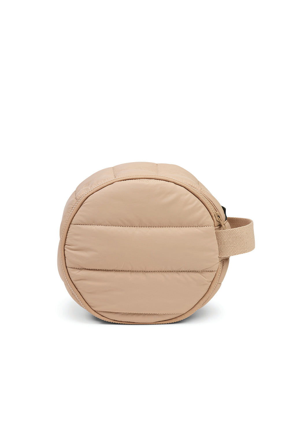 Round sand-colored quilted cosmetic bag with handle, displayed on white background
