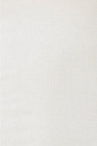Close-up of white fabric texture of bonnie ribbed long sleeve midi henley nightdress ecru