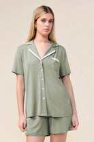 Woman wearing the Allegra Short Bamboo PJ Set in Olive, close front view of camp collar and pocket