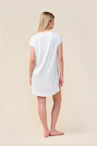Woman wearing the Ashley Bamboo Sleep Tee in Ecru, back view