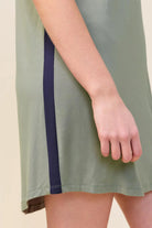 Close-up of the Ashley Bamboo Sleep Tee in Olive, showing the contrast side stripe
