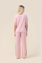 Woman wearing the Bronte Bamboo T-Shirt with Stripe in Pink, back view