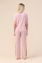 Woman wearing the Inez Bamboo Pant with Stripe in Pink, back view