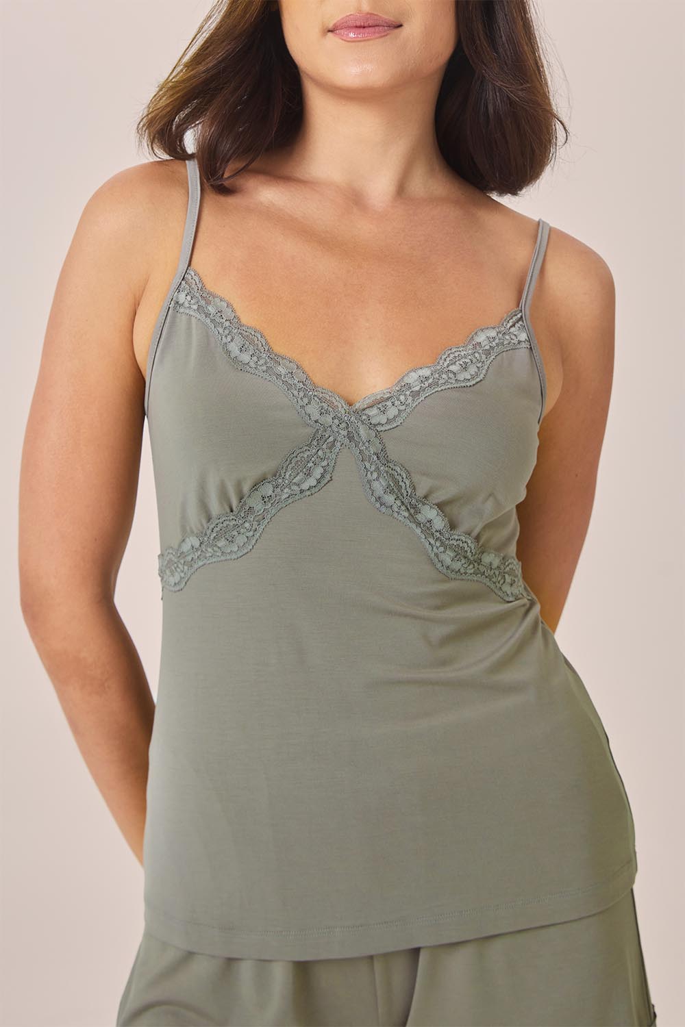 Close-up of the Mabel Bamboo Cami and Short Set in Olive, showing the lace detail on the cami