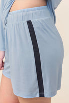 Close-up of the Pippa Bamboo Shorts with Stripe in Blue, showing the contrast side stripe