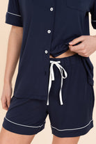 Close-up of the Sadie Bamboo Short PJ Set in Navy, showing the drawstring waist shorts with white piping